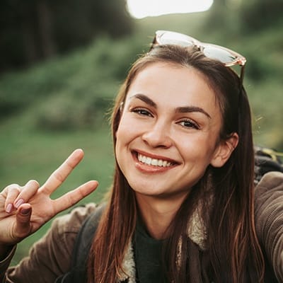 Woman with healthy smile outdoors
