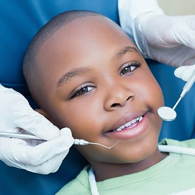 Child receiving dental exam