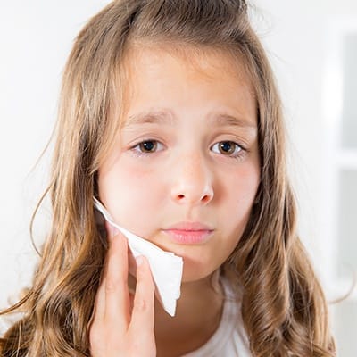 Little girl with child’s toothache in McKinney