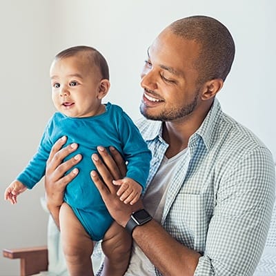 Father holding baby