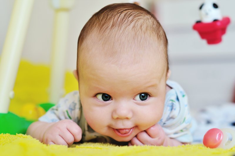 a baby with its tongue out