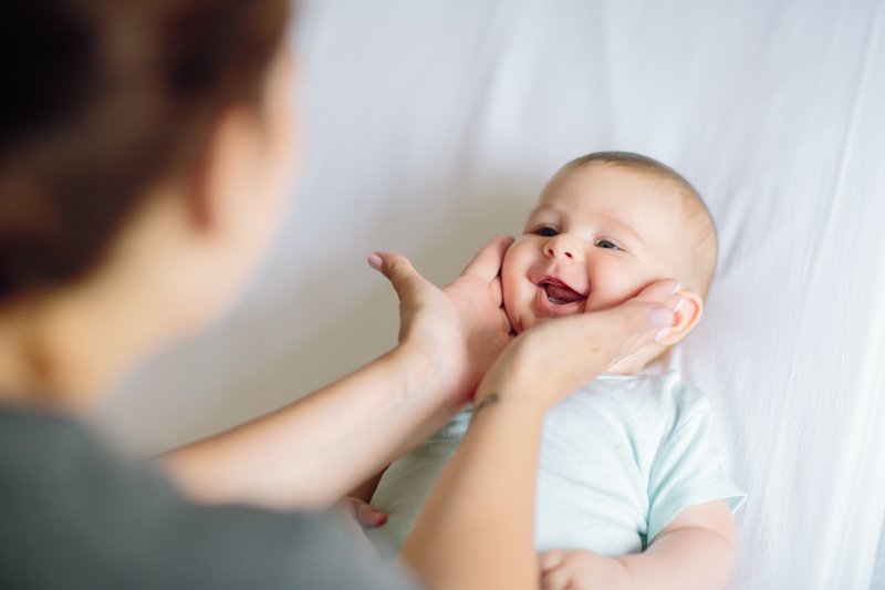 a mother and happy baby