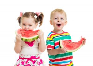 children eating watermelon 