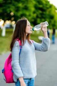teenager drinking water 