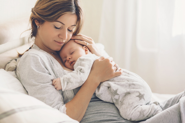 baby contact napping on mom