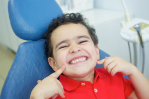 a closeup of a smiling child 