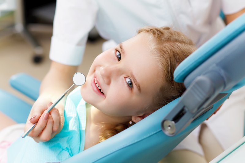 little girl in the treatment chair